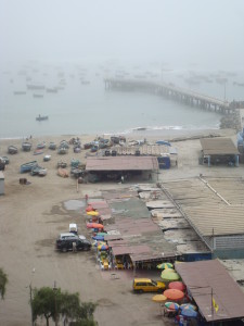 Everything in one place - fishing boat, pier and market below