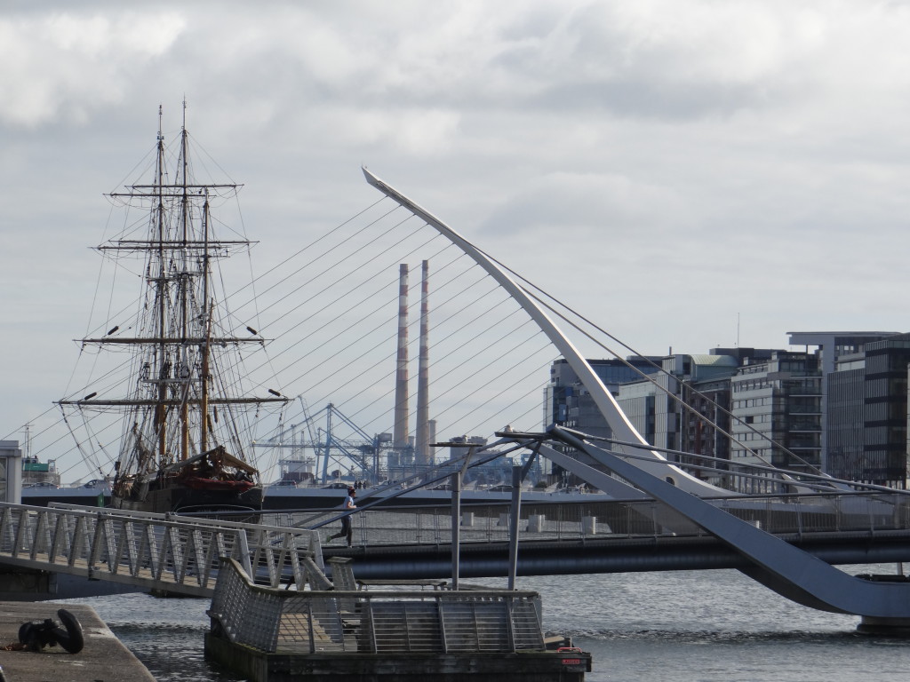 Harp Bridge, boats and more along the Liffey River in Dublin