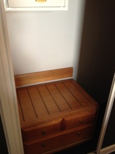 The storage cabinet just didn't fit the contemporary colorful feel of the room