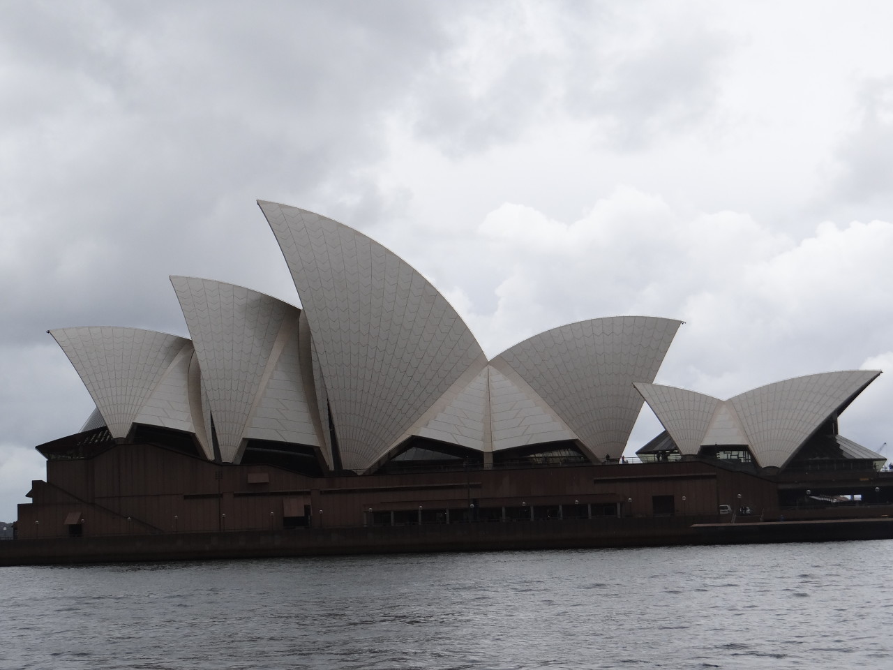 Sydney Opera House in clouds and rain