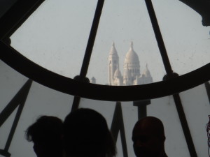 Sacre Coeur Paris view from Musee D'Orsay clock