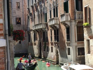 Venice canal view boats gondolas kayaks