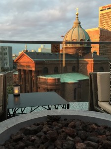 The logan hotel rooftop bar view of cathedral sunset photos at night