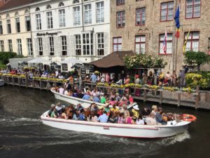Bruges Canal Tour Boats across from Hotel De Tuilerieen