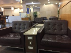 Brown leather chairs with outlets AA lounge heathrow