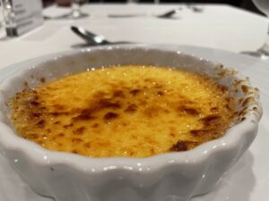 Creme brulee in a white container