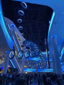 Sphere Las Vegas main lobby with blue lighting and metal circle art installation from the ceiling