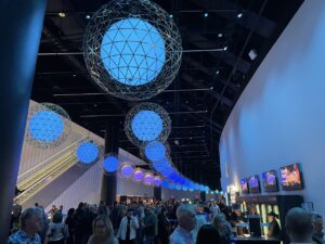 Terrace Lobby view inside the Sphere with blue lighting and metal spheres