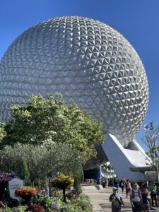 Iconic Silver Globe at Epcot Spaceship Earth with trees in front left