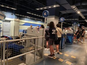 Boarding line with numbers on the floor at Epcot Test Track