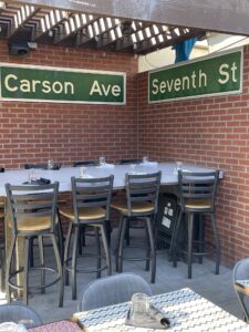 7th & Carson Restaurant Las Vegas outdoor high top table set for eight on the patio