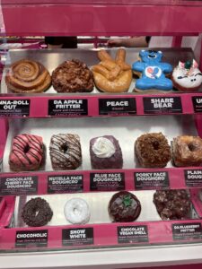 Downtown Las Vegas Pinkbox doughnuts five across and three down in various shapes and colors