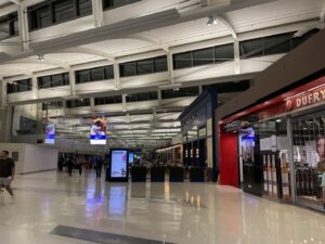 Newark concourse at night is bright and empty