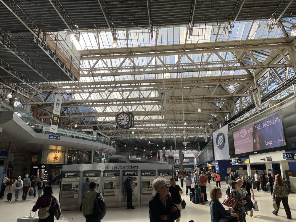Waterloo train station with people walking